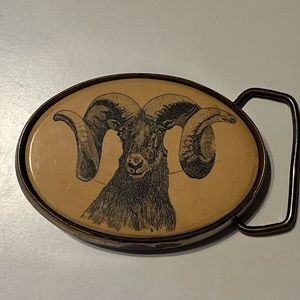 Vintage 1983 brass bighorn sheep belt buckle.